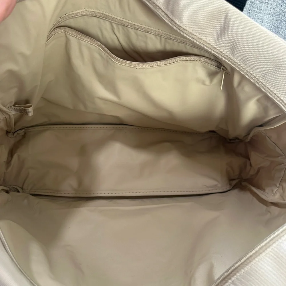 Calvin Klein Tan and Black Laptop Bag with Sturdy Fabric